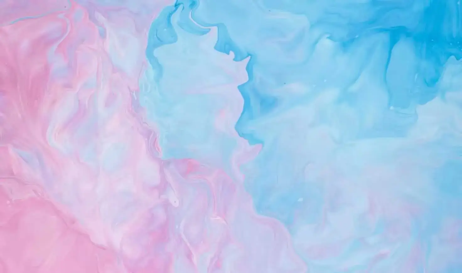 Soft pink and baby blue water ripples together in a subtle texture.